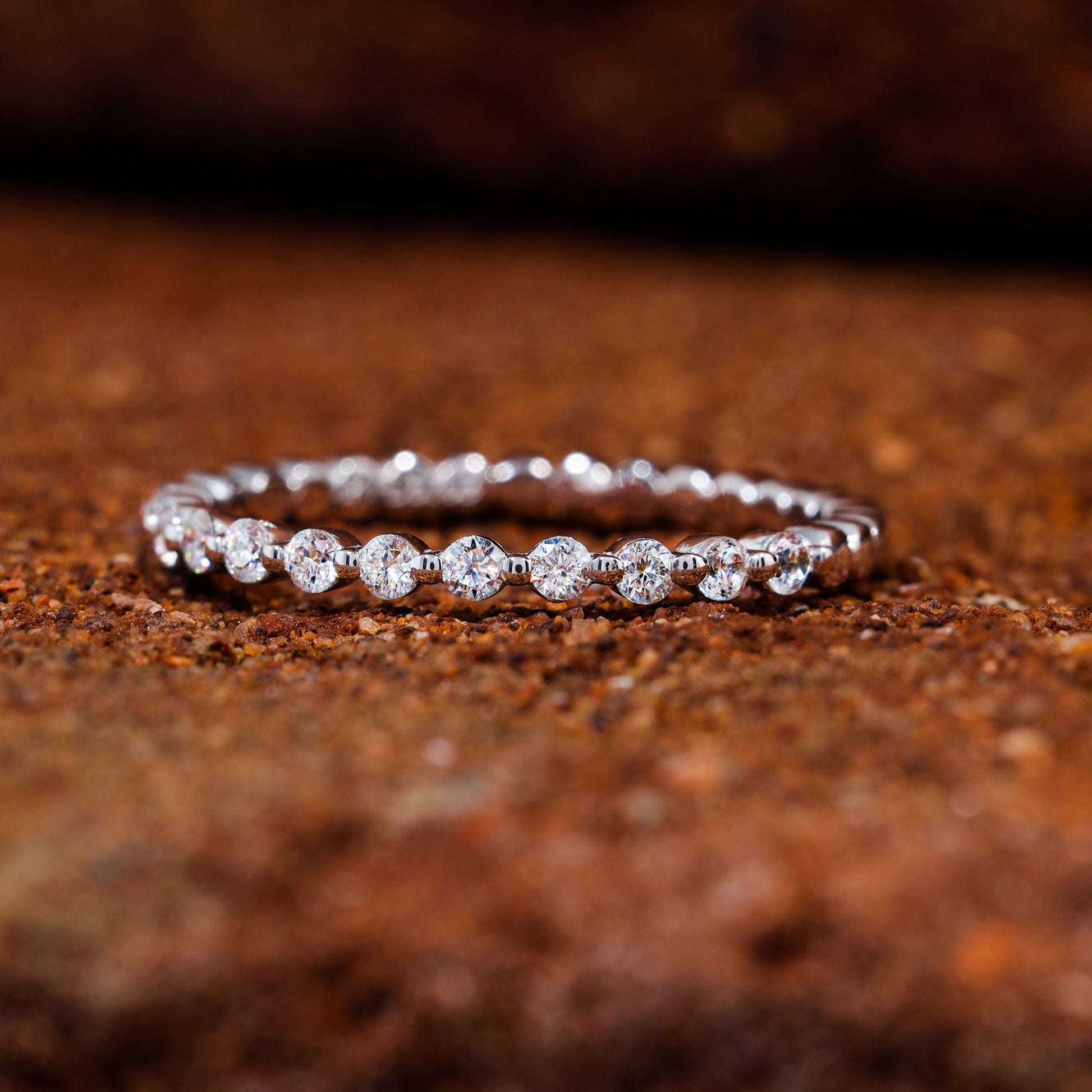 Round Cut Moissanite Shared Prong Set Wedding Band