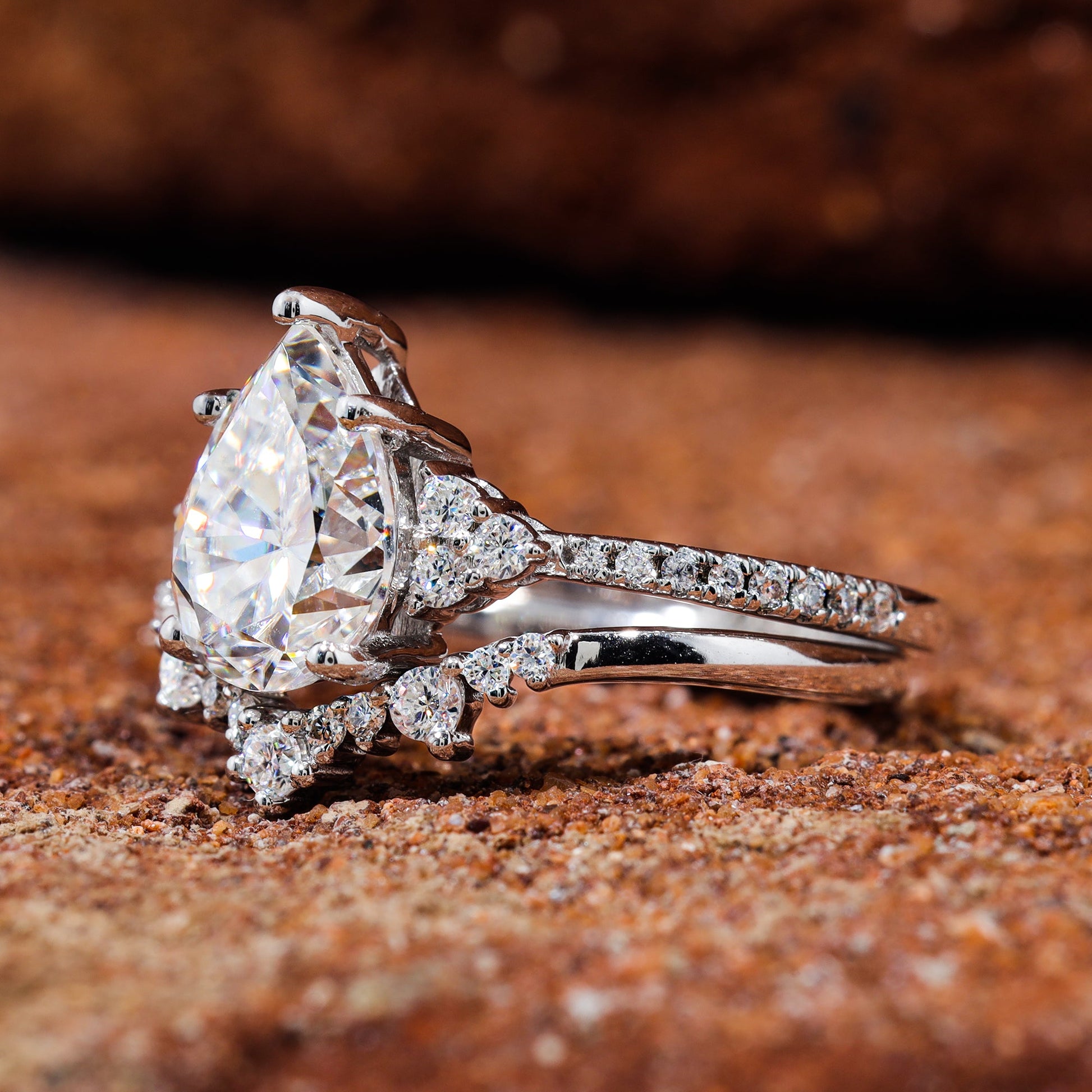 Pear Cut Moissanite Curved Engagement Ring Set