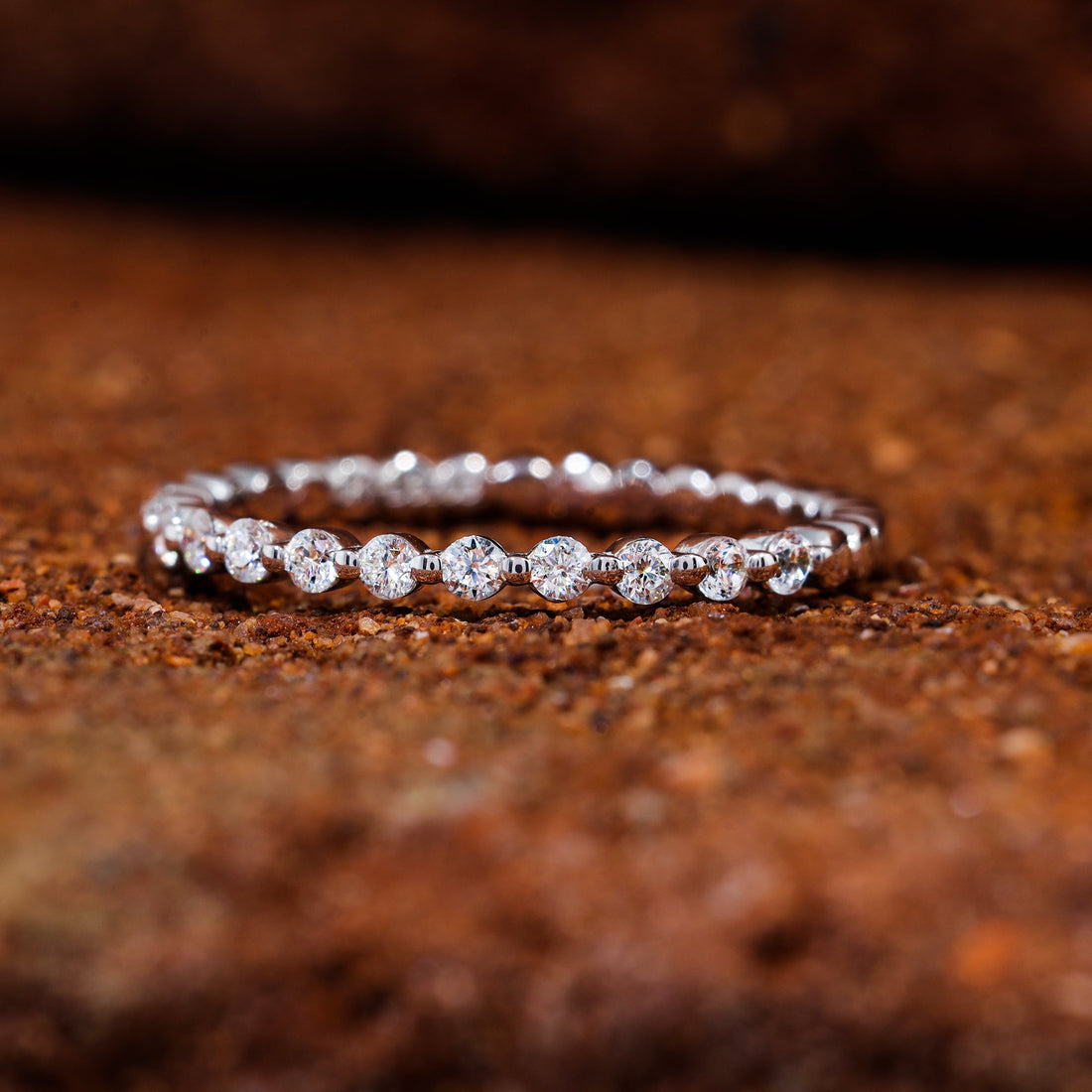 Round Cut Moissanite Shared Prong Set Wedding Band
