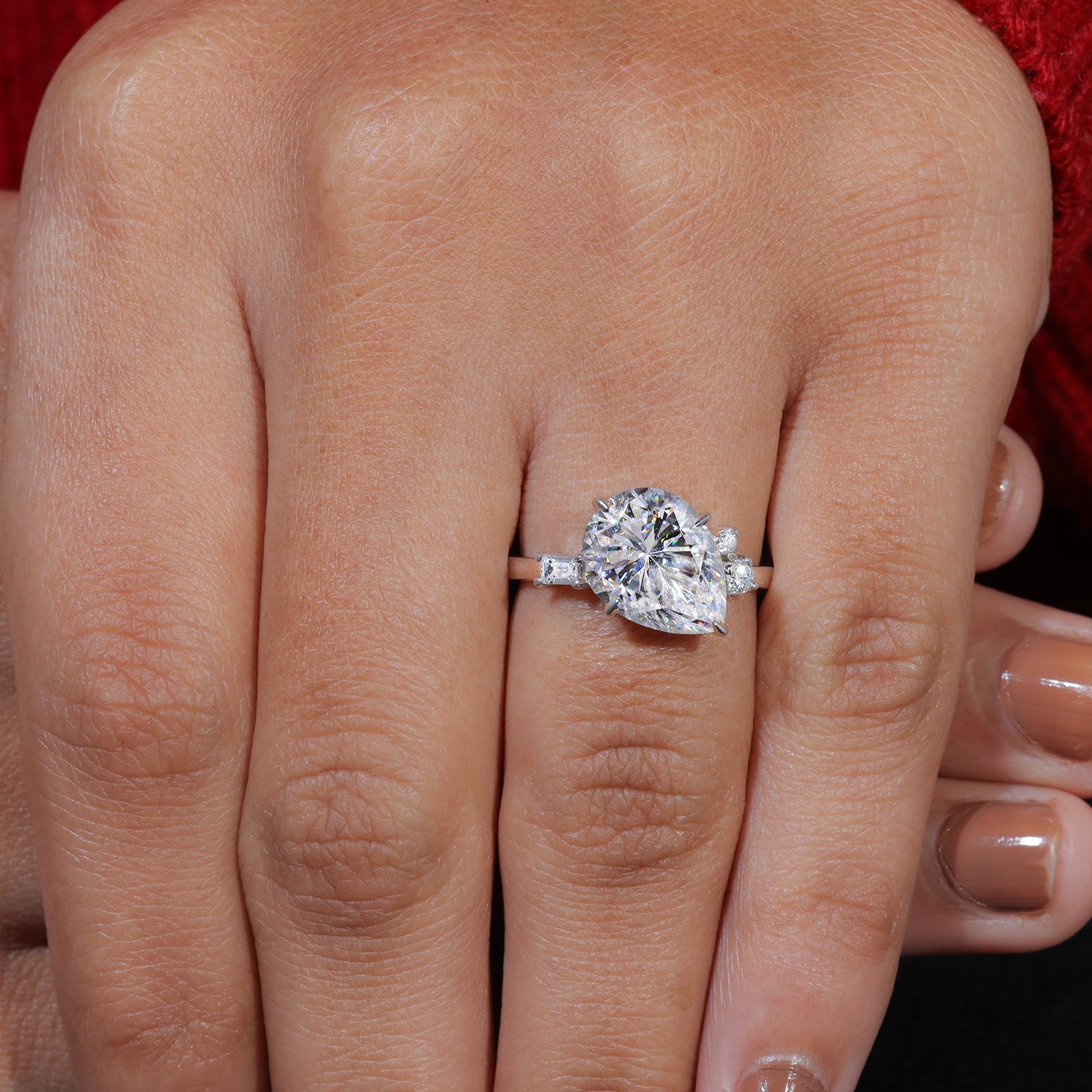 Compass Prong Set Pear Cut Moissanite Engagemnt Ring